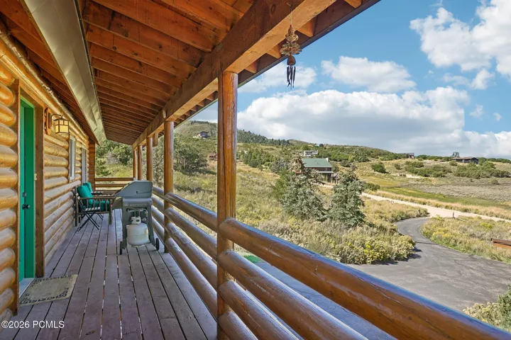 Open meadow and rolling hills from the deck, the view that makes the strongest case for Timber Lakes above Heber City.Open meadow and rolling hills from the deck, the view that makes the strongest case for Timber Lakes above Heber City.Deck overlooking open meadow and rolling hills in the Timber Lakes community above Heber City.
