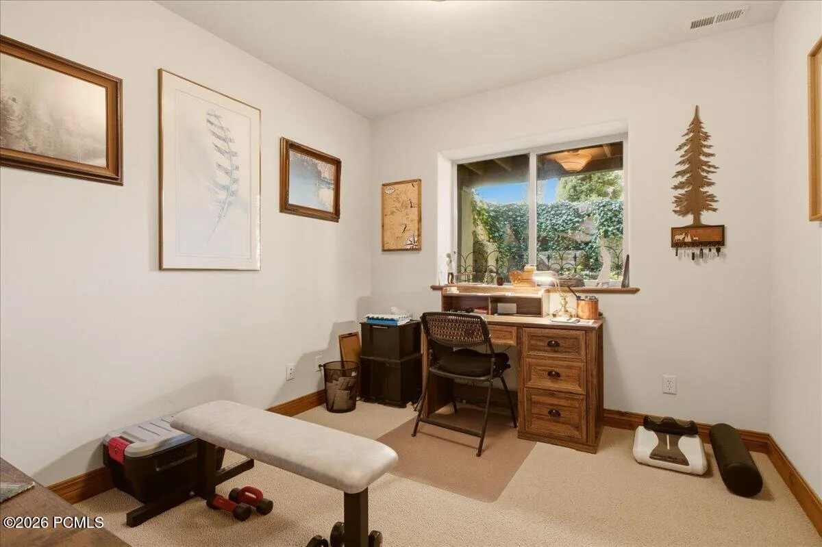 Bedroom featuring a double-pane window with lots of natural light