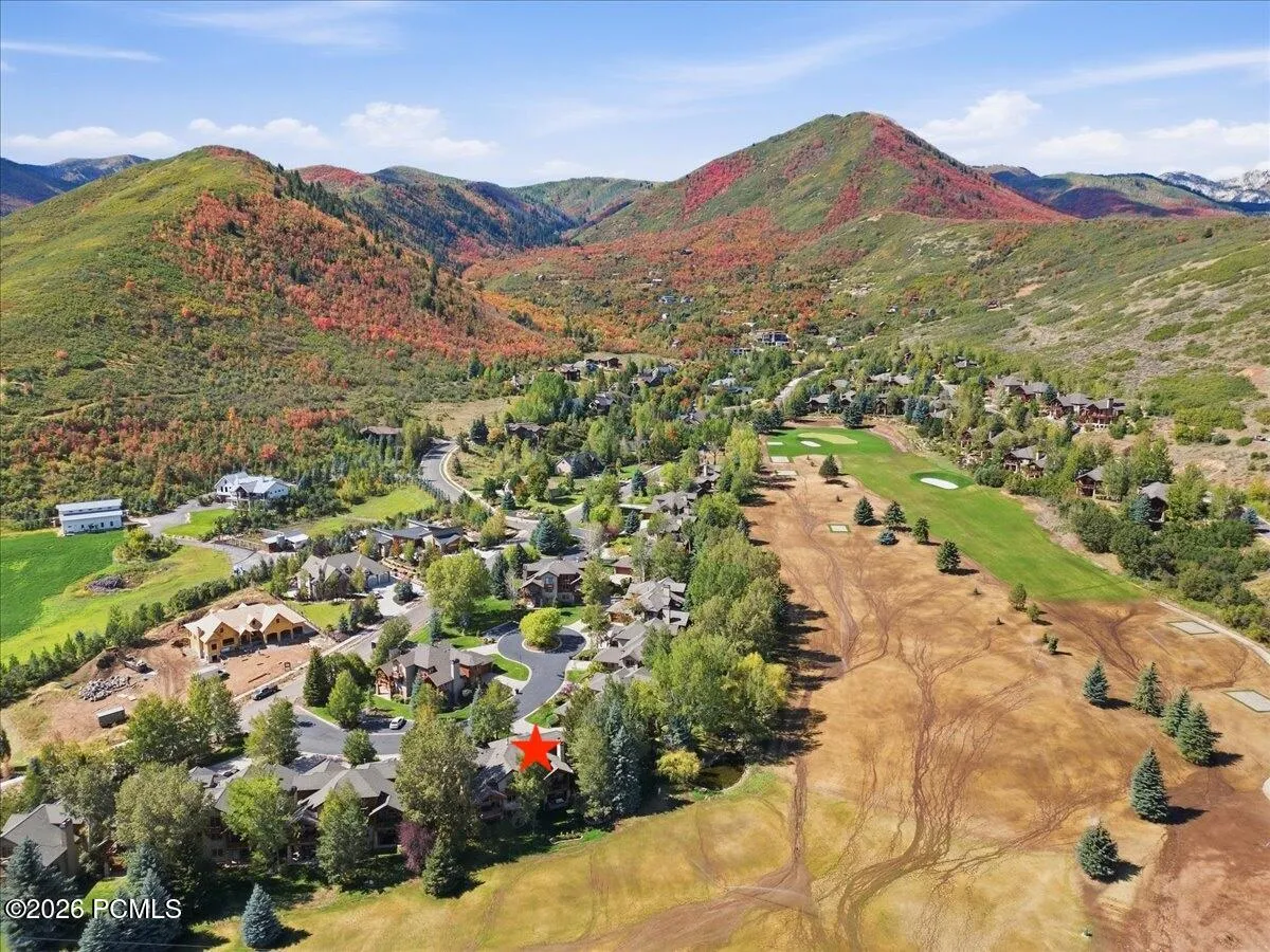 Aerial view of the landscape featuring a mountainous backdrop
