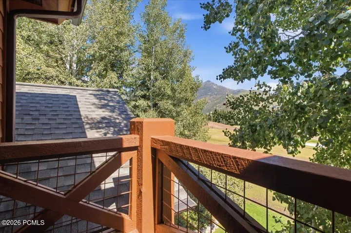 Owner's suite balcony overlooking the golf course with mountain views