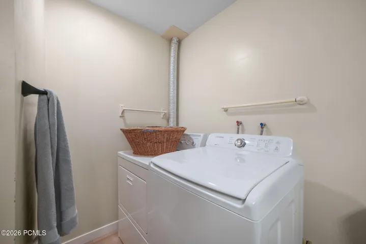 Dedicated laundry area inside Level 1 bathroom