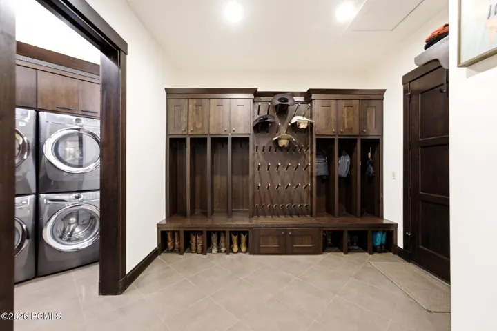 Just off Garage for easy drop area along with abundant storage and built in boot warmers.