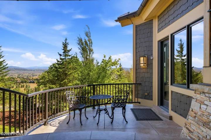Overlooking the magnificent year-round running water fall and golf course views.