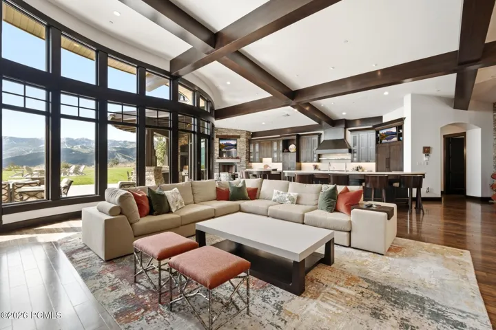 Sophisticated beam work set against curved walls of glass make this unforgettable architecture.