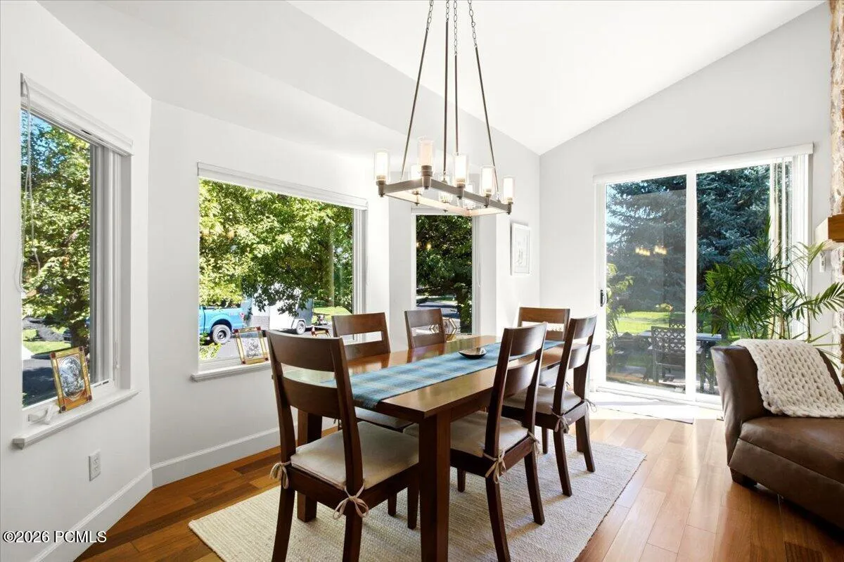 Dining area featuring multiple large windows, and a sliding glass door