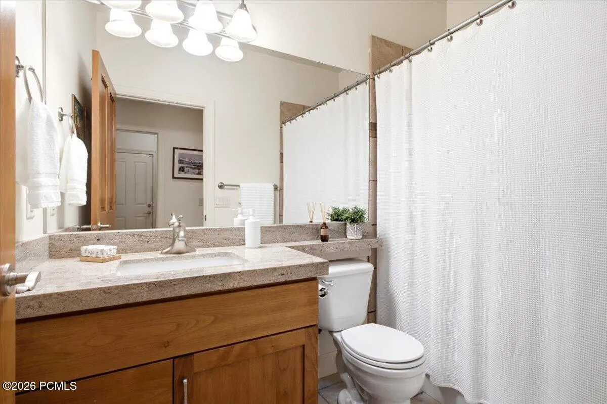 Bathroom featuring a granite countertop