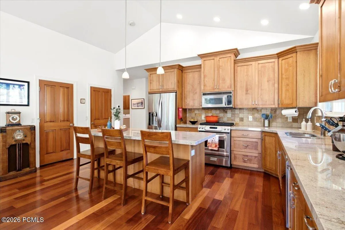 Kitchen featuring stainless steel appliances, and a center island