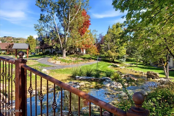 walking path bridge overlooking a creek
