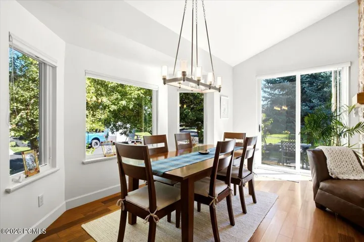 Dining area featuring multiple large windows, and a sliding glass door