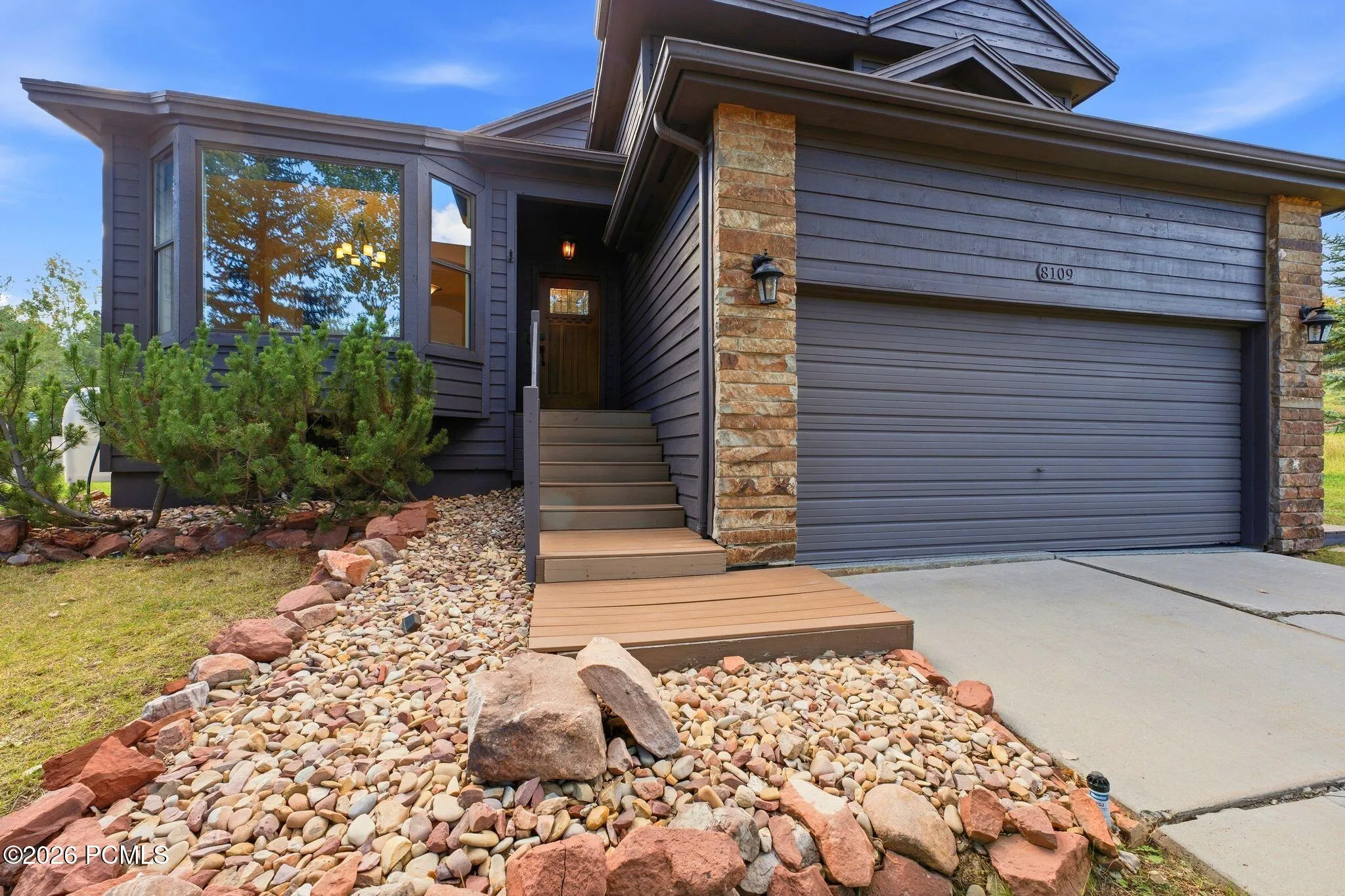 Driveway with easy access to the attached two-car garage.