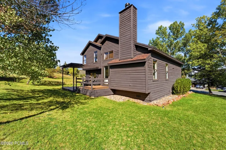 The 0.16-acre lot borders Pinebrook Park.