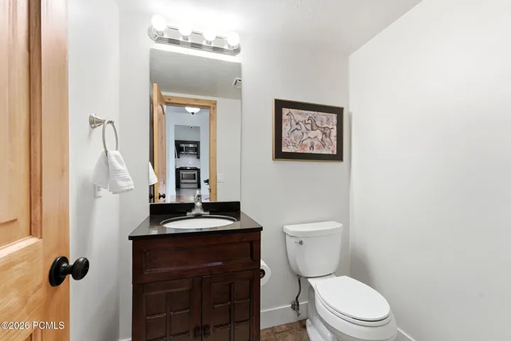 Powder room off the entry, convenient for guests.