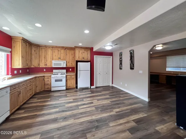 Lower-level kitchen w/ knotty alder cabinets
