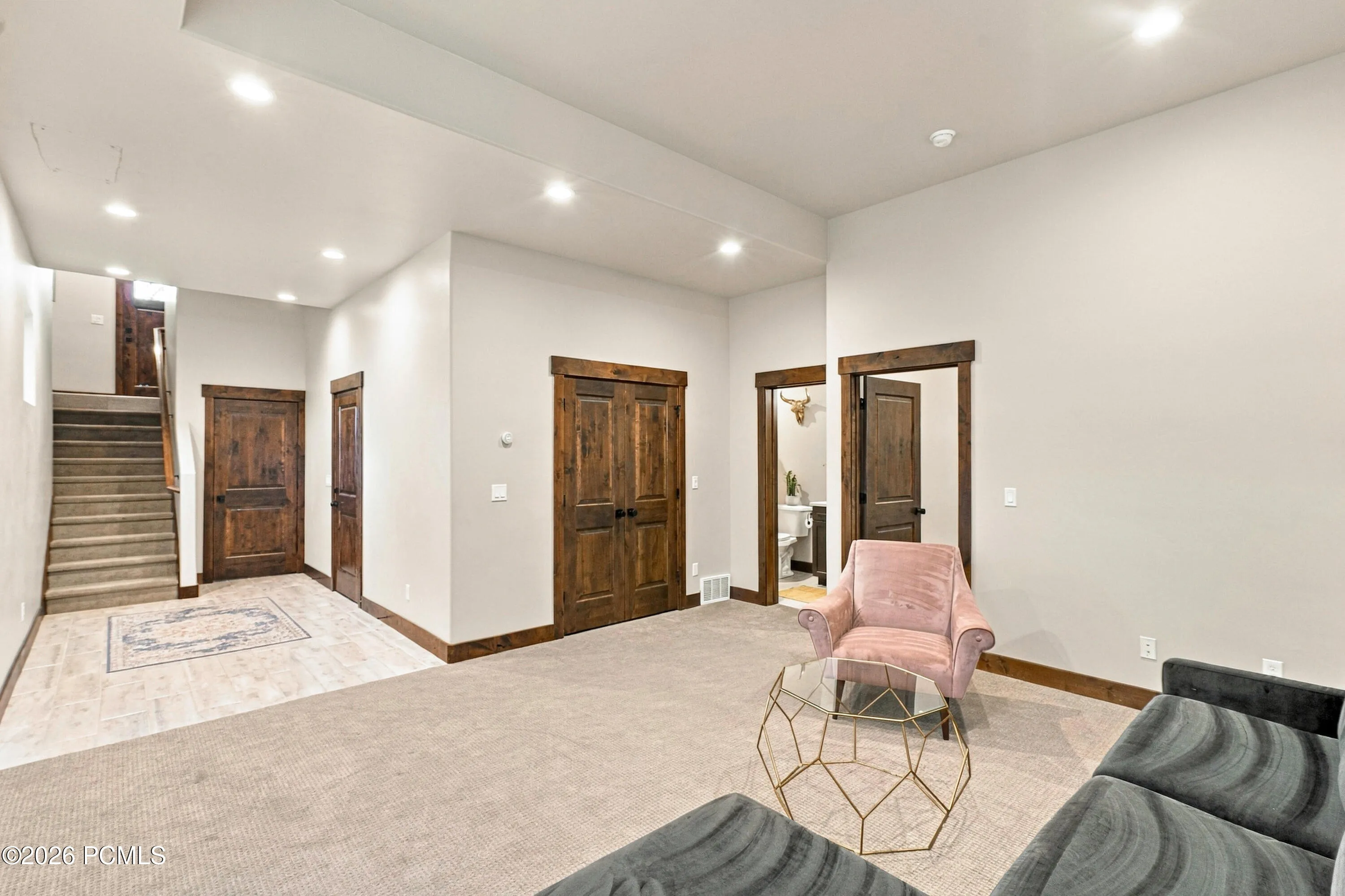 Basement Entry from Garage. Upstairs to Left or Right to Large Family Room