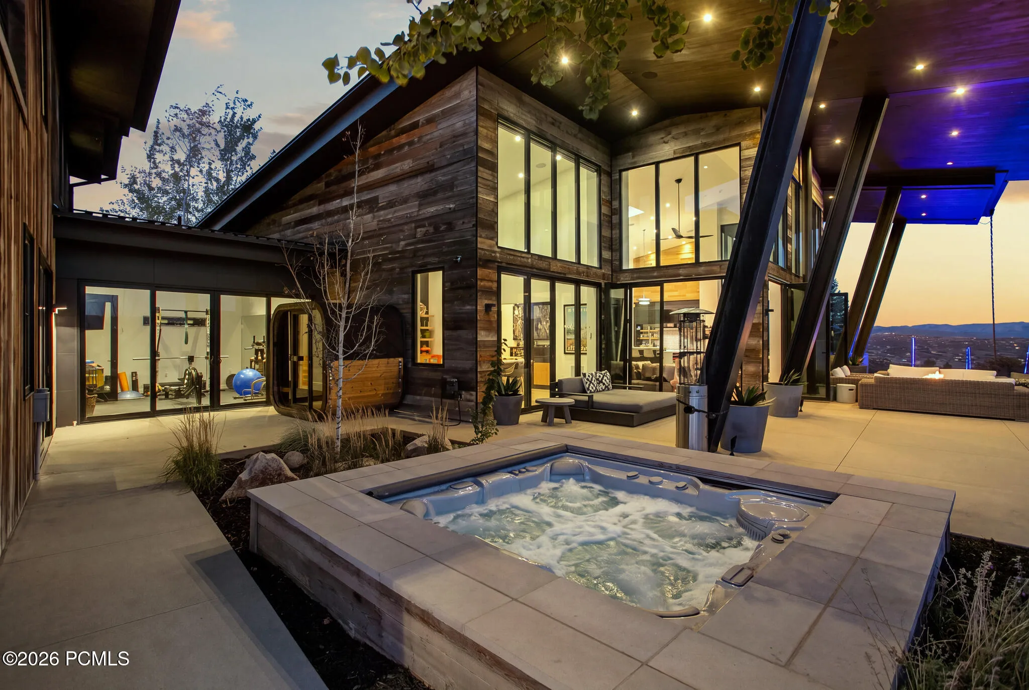 Private hot tub just steps from the primary suite and exercise room.