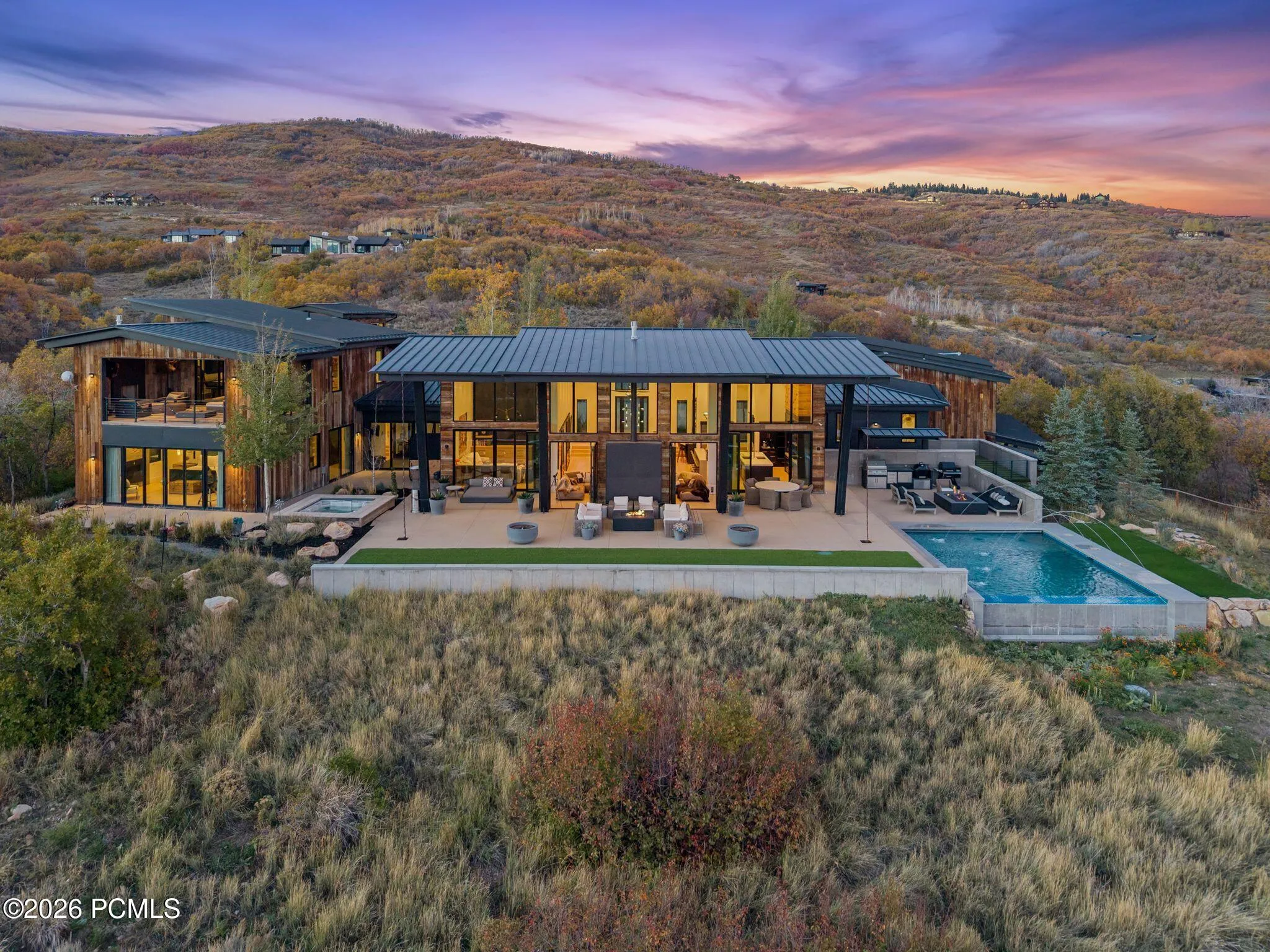 Presenting the private Mountain Bluebird Estate. Situated on 10.88 acres near the top of The Preserve in Park City. This contemporary architectural masterpiece is the perfect mountain retreat.