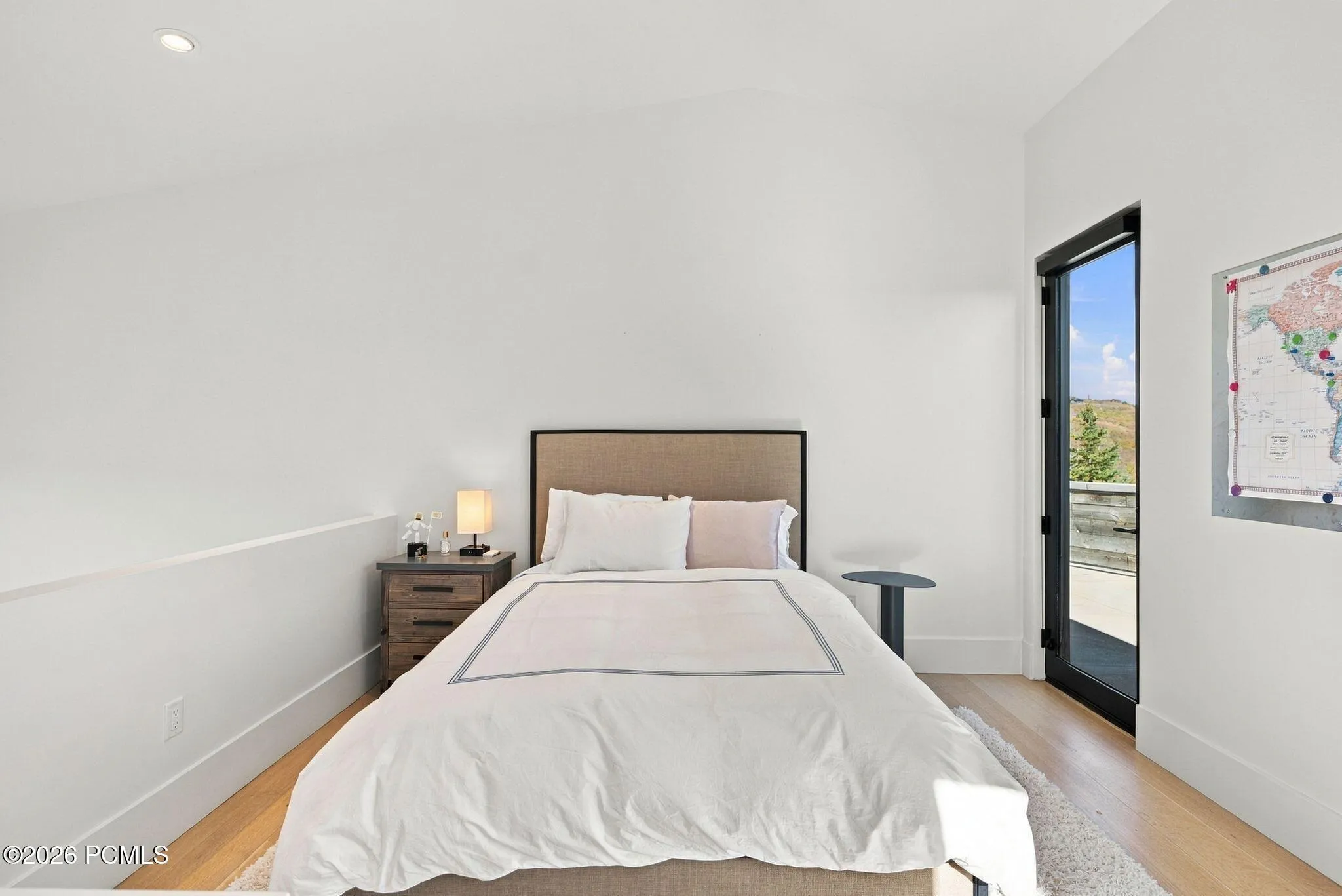 First multi-level bedroom in west wing of home. Each room features living space, bathroom and walk-in closet on main level with bedroom and terrace access upstairs.