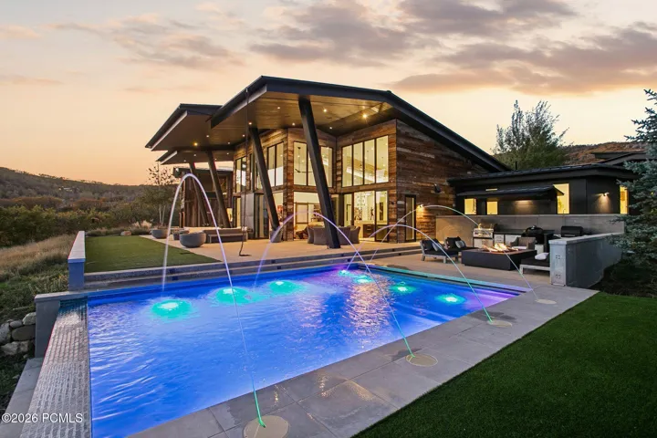 Presenting the private Mountain Bluebird Estate. Situated on 10.88 acres near the top of The Preserve in Park City. This contemporary architectural masterpiece is the perfect mountain retreat.