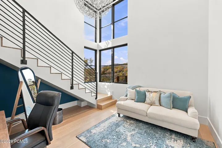 Third multi-level bedroom in west wing of home. Each room features living space, bathroom and walk-in closet on main level with bedroom and terrace access upstairs.