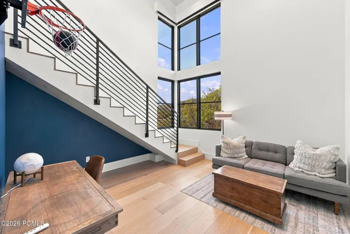 First multi-level bedroom in west wing of home. Each room features living space, bathroom and walk-in closet on main level with bedroom and terrace access upstairs.
