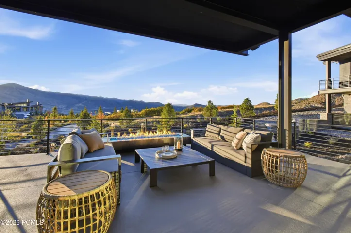 A seamless extension of the residence, the expansive covered deck offers a private vantage point overlooking the breathtaking Deer Valley landscape. The warmth of an outdoor fireplace & discreetly integrated audio create an intimate, sophisticated setting, where sweeping vistas & the changing seasons become part of the everyday experience.