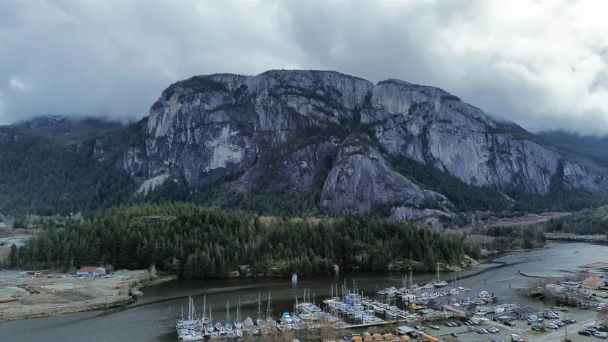 Mountain view with a water view and a wooded view