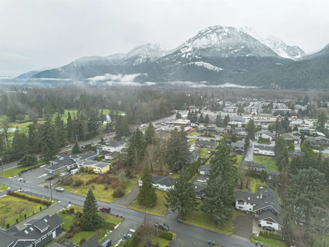 Aerial view of residential area with a mountainous background