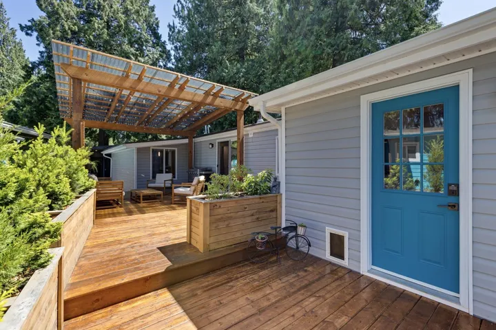 Wooden terrace with a pergola
