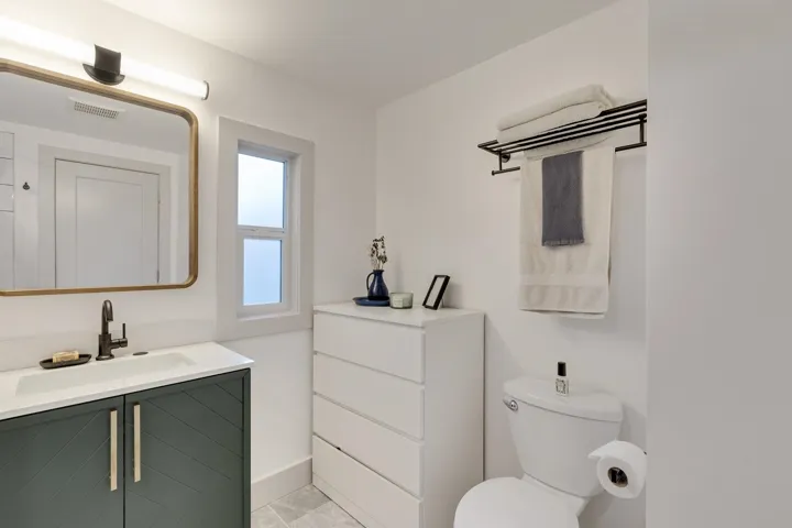 Bathroom with toilet and vanity