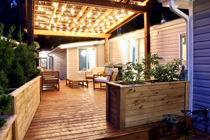 Wooden deck featuring outdoor lounge area