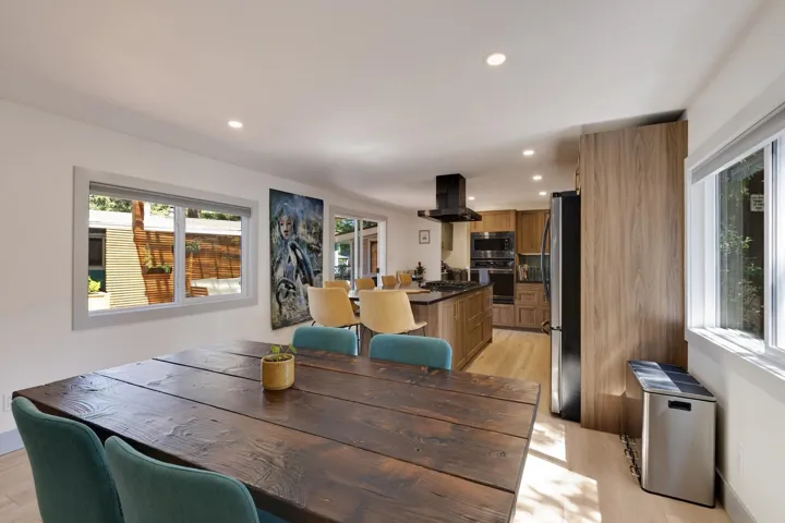 Dining space featuring recessed lighting and light wood-style flooring