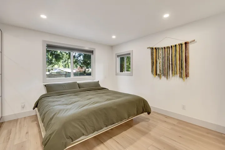 Bedroom featuring light wood-style flooring and recessed lighting