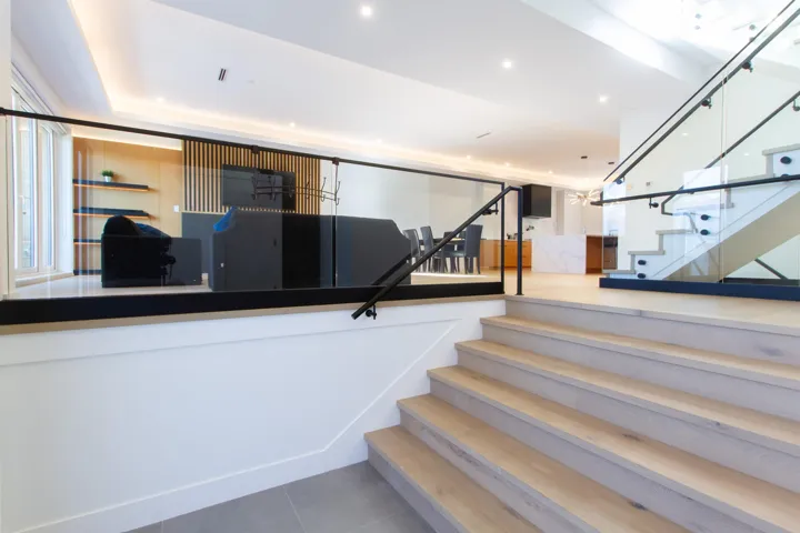 Stairway featuring tile patterned flooring and recessed lighting