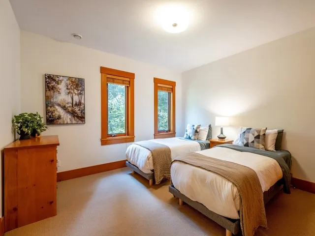 Carpeted bedroom with baseboards