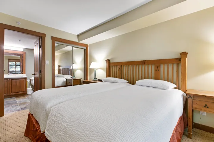 Bedroom featuring a closet and baseboards