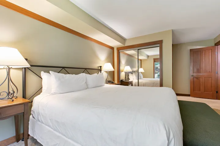 Bedroom with baseboards and a closet