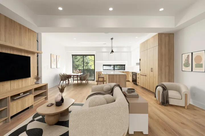 Living room featuring light wood finished floors and recessed lighting