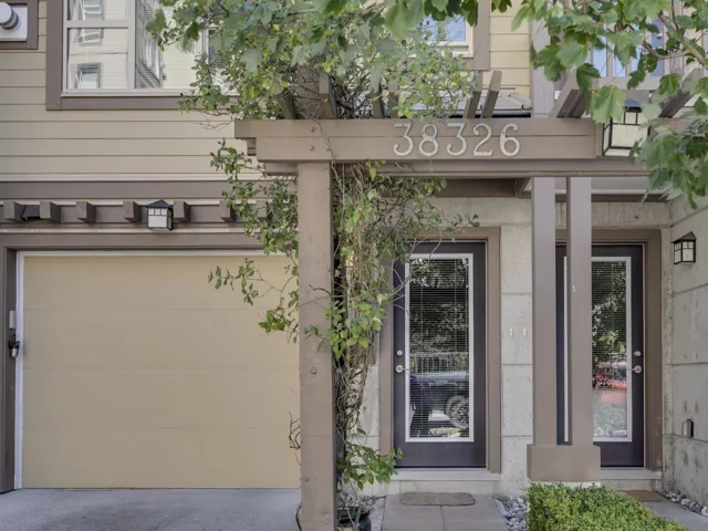 Entrance to property featuring a garage
