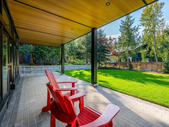 Fenced backyard with a patio area