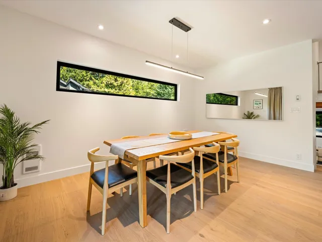 Dining room featuring light wood-type flooring and recessed lighting