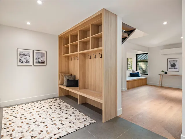 Mudroom featuring recessed lighting, tile patterned flooring, and a wall mounted air conditioner