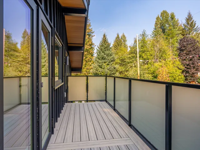 Balcony with view of scattered trees