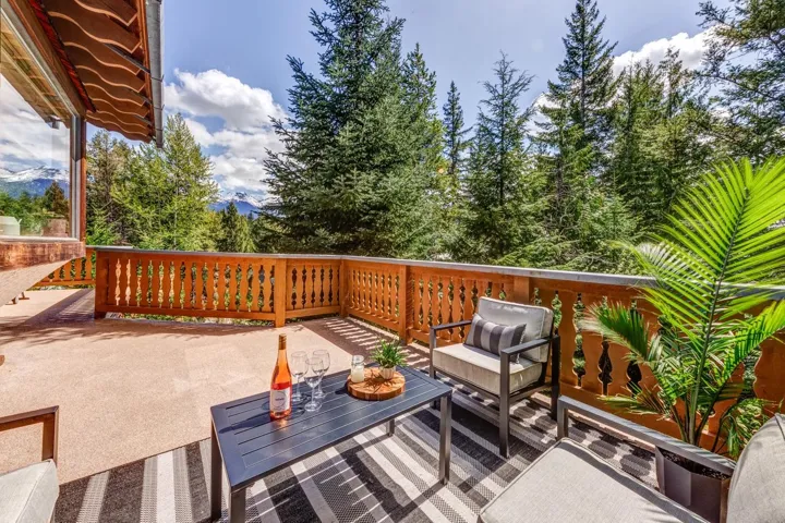 Deck with an outdoor hangout area and a patio