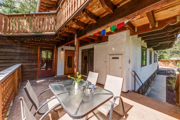 View of patio with outdoor dining area