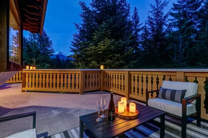 Wooden terrace featuring a patio area