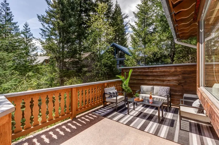 Wooden deck with an outdoor hangout area