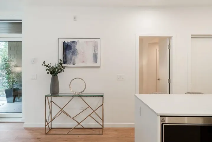 Detailed view of wine cooler and wood finished floors