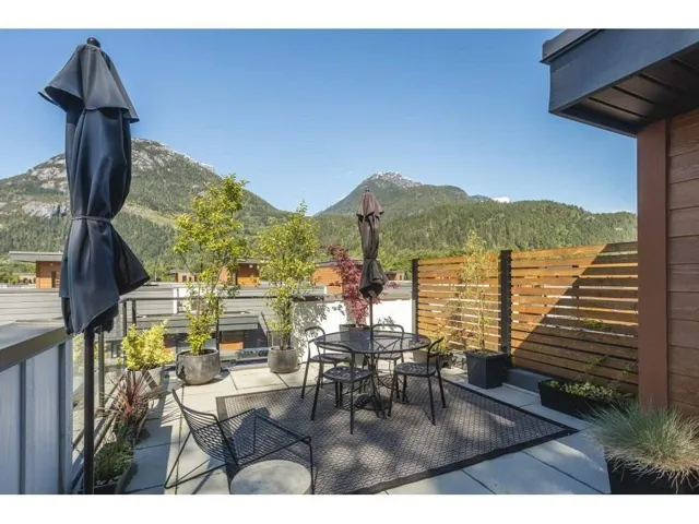 View of patio / terrace with outdoor dining area and a mountain view