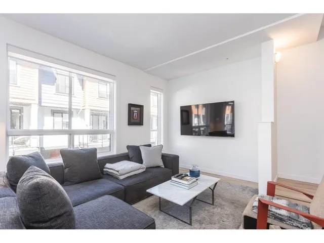 Living room featuring wood finished floors and baseboards