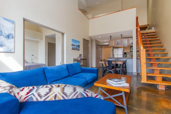 Living area featuring stairway
